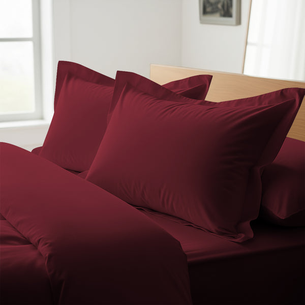RIo red oxford king pillowcases royal 1000 thread count on pillows on bed in bedroom