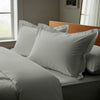 Silver oxford standard pillowcases luxurious 800 thread count on pillows on bed in bedroom