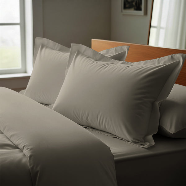 Simply taupe oxford standard pillowcases luxurious 800 thread count on pillows on bed in bedroom