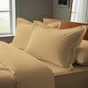 tan oxford standard pillowcases premium 400 thread count on pillows on bed in bedroom 