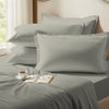 Silver oxford standard pillowcases premium 400 thread count on pillows on bed in bedroom