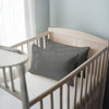 Toddler bed with dark grey 33 x 46 cm cotton pillowcase on the pillow